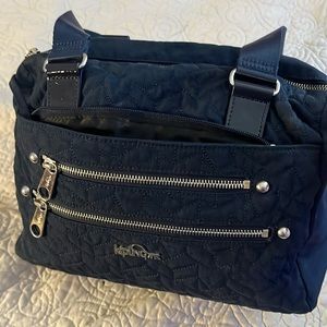 Kipling dark navy blue handbag.